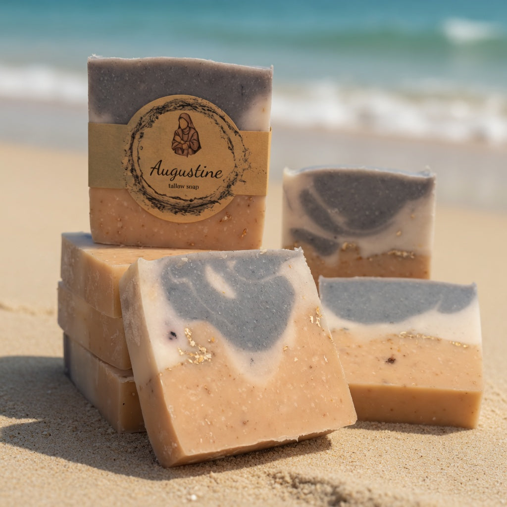 Bar of soap with 'Augustine' label on a sandy beach
