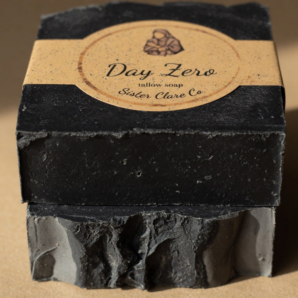 Day Zero tallow soap cut bar close-up showing solid black texture – Sister Clare Co.