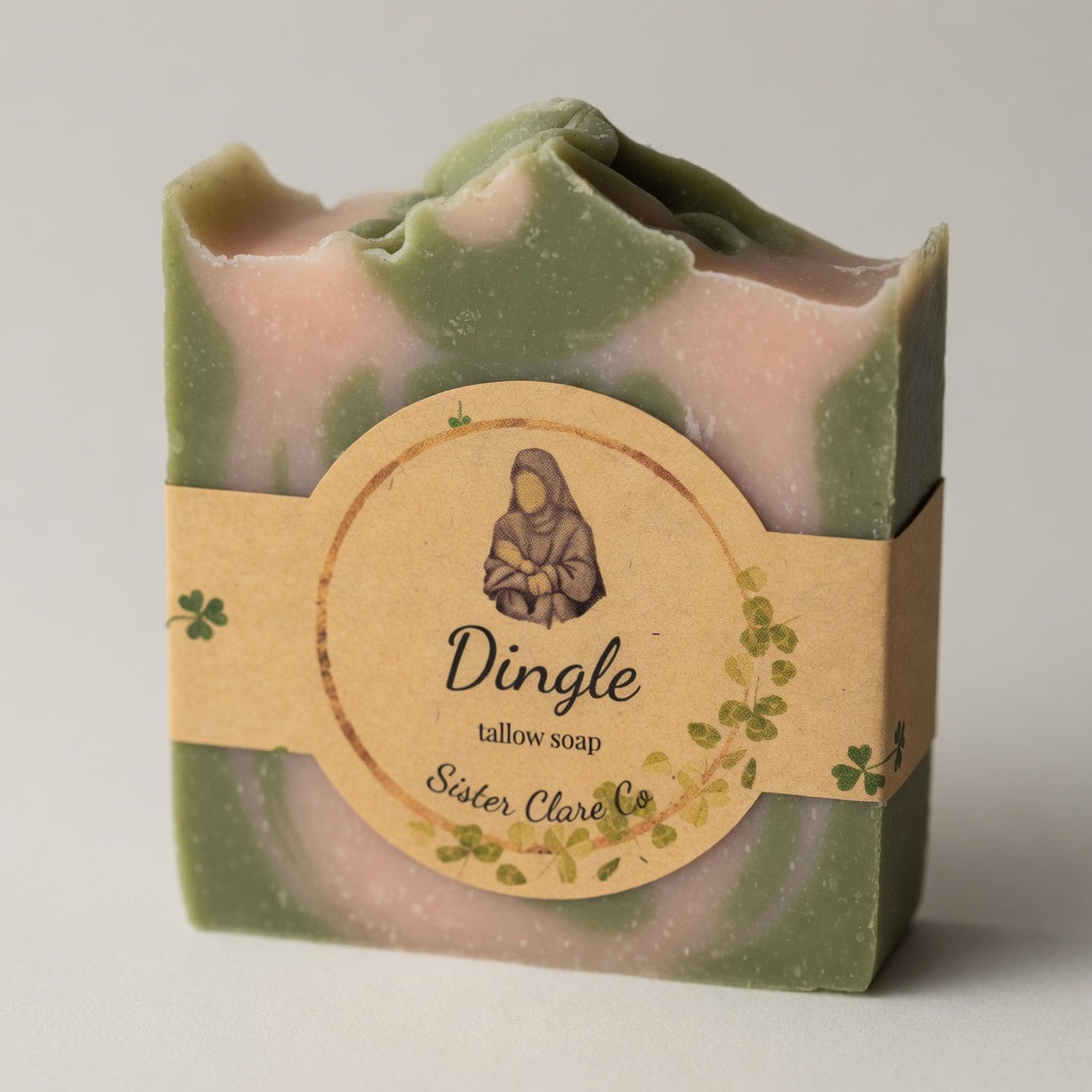 Close-up of Dingle Tallow Soap showing beautiful white and green swirls and exact nun logo label – nourishing tallow and refreshing lemongrass. Sister Clare Co. Handmade with Love & Prayer • Joy Purely Natural